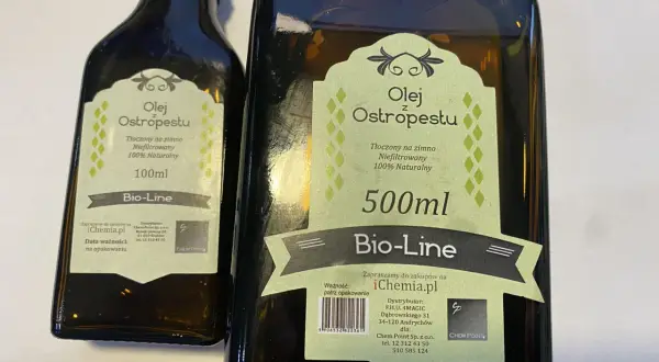 Dwie butelki oleju z ostropestu, 100ml i 500ml, tłoczone na zimno, niefiltrowane, 100% naturalne. Poznaj olej z ostropestu właściwości!